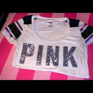 Pink brand t -shirt full of bling on front and sleeves. Size Small